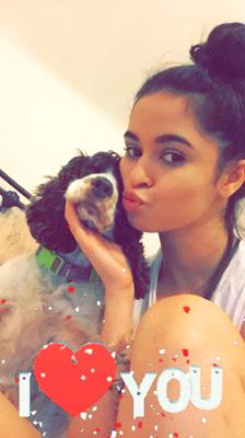 Bethan telling her cocker spaniel that she loves her