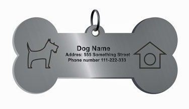 A silver, bone-shaped dog tag, engraved. The photo is taken against a white background.